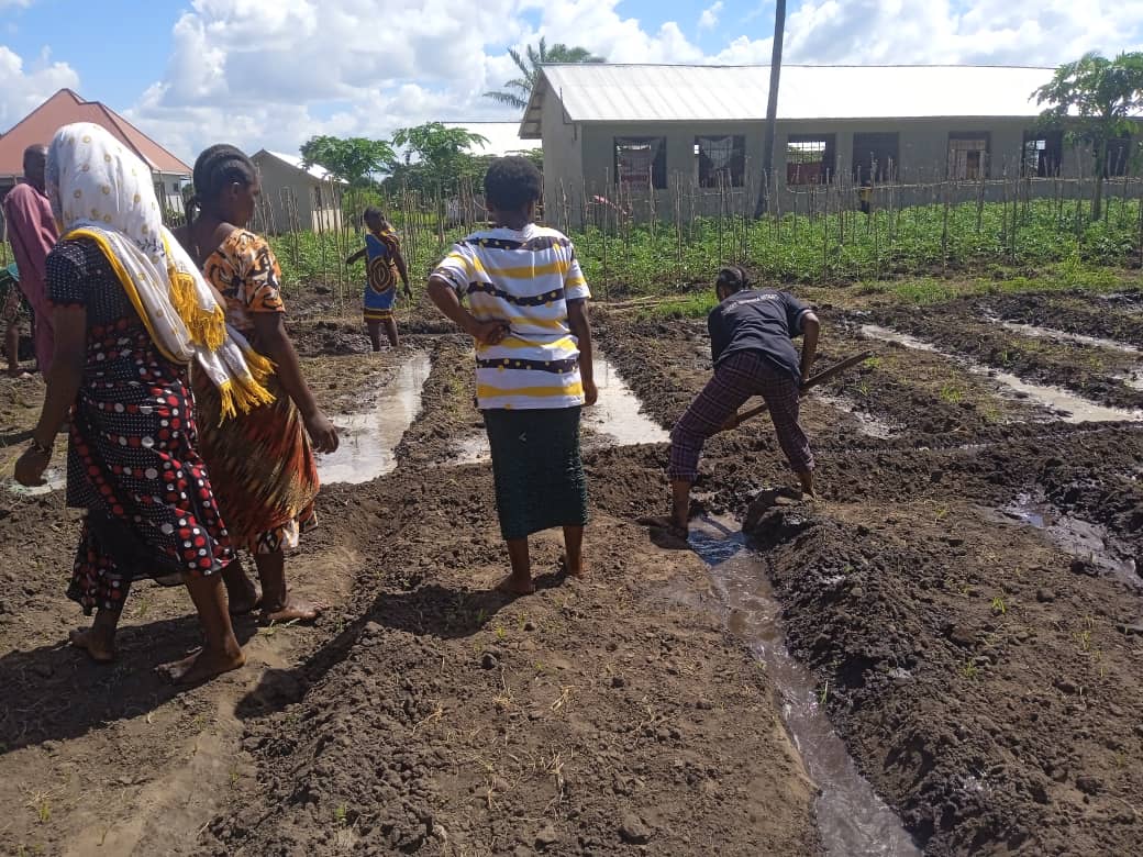 Young mothers participating in agricultural training